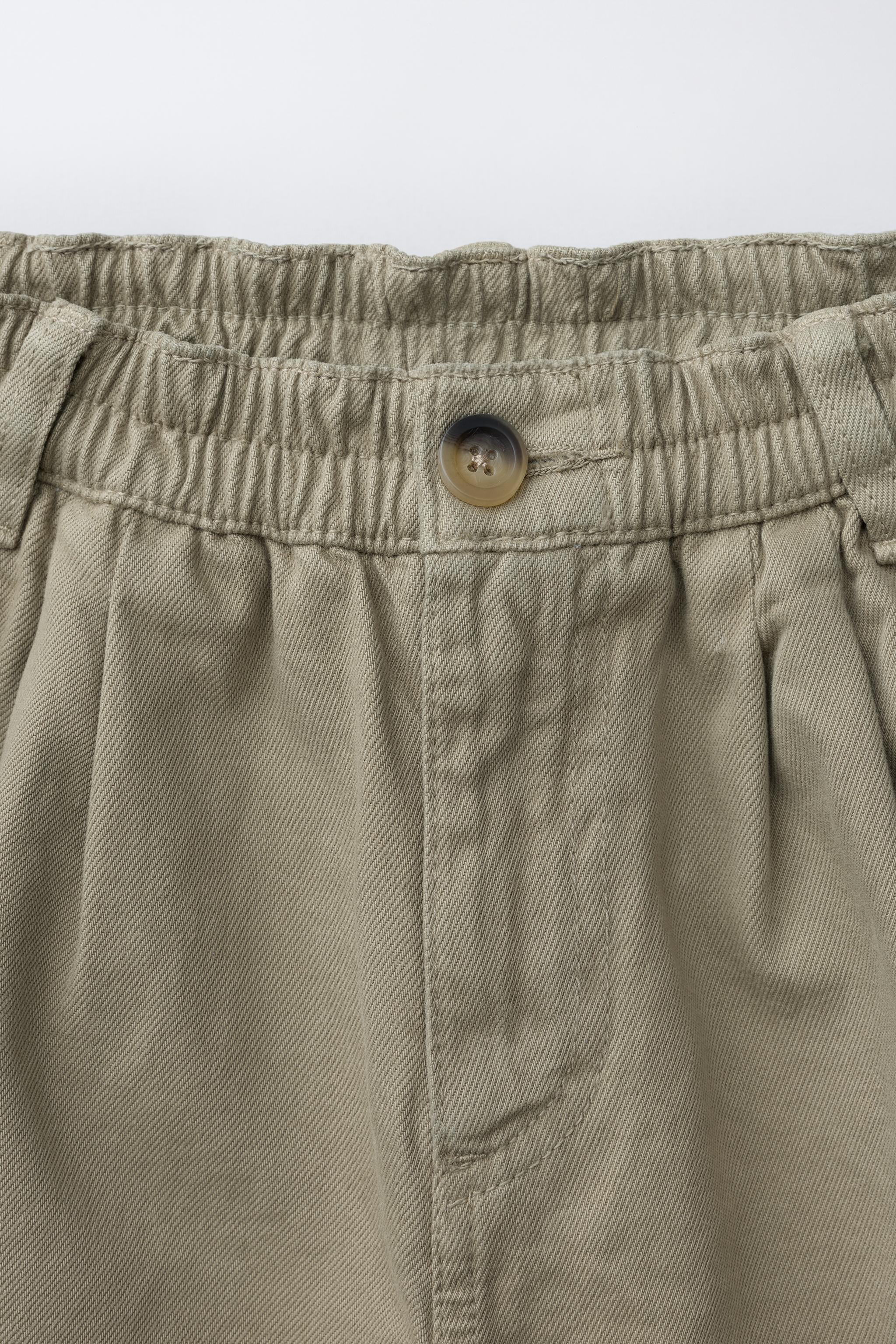 PLEATED SHORTS